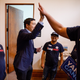 Yang high-fives a member of his “Yang Gang” of supporters.
